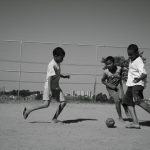 Kids playing soccer in Brazil