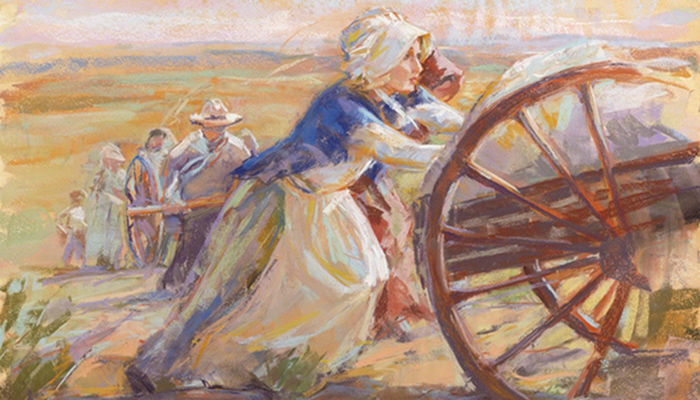 Mormon pioneer woman pushing handcart