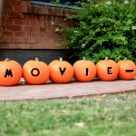Directions to Halloween Movie Night carved in Pumpkins