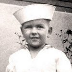 Young Russel M Nelson in a sailor suit
