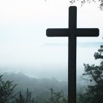The cross of Jesus Christ with misty background