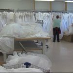 Women sort through DI wedding dress donation