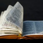 A Bible with pages fluttering