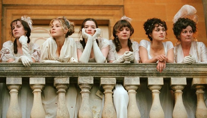Bennet sisters on a balcony
