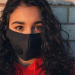 school girl in face mask